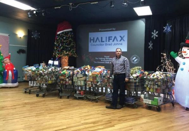 Brad Johns with Food Bank Donations